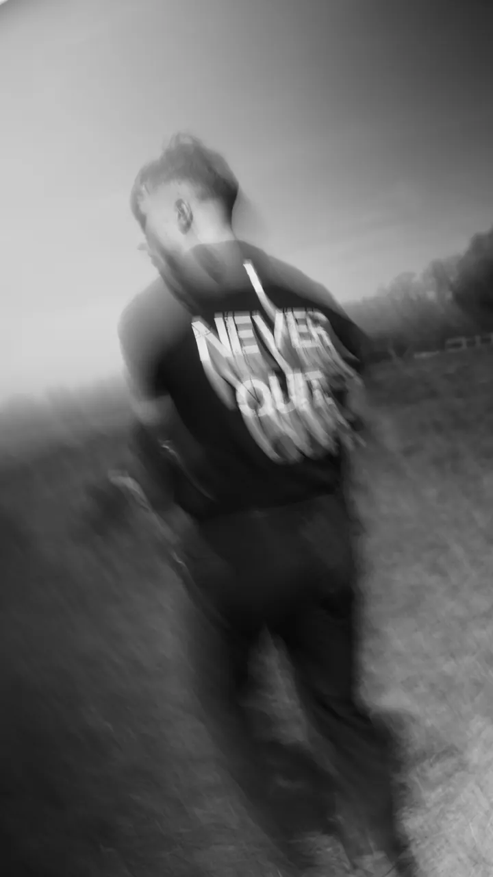 Motion-blurred shot of a participant in a Never Quit shirt
